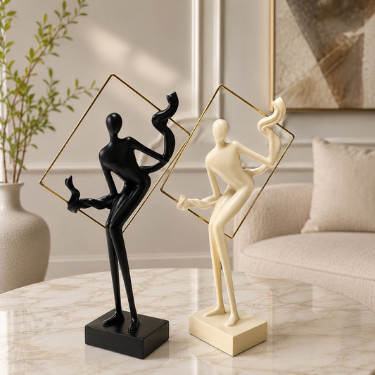 Black & Ivory Figurine Pair